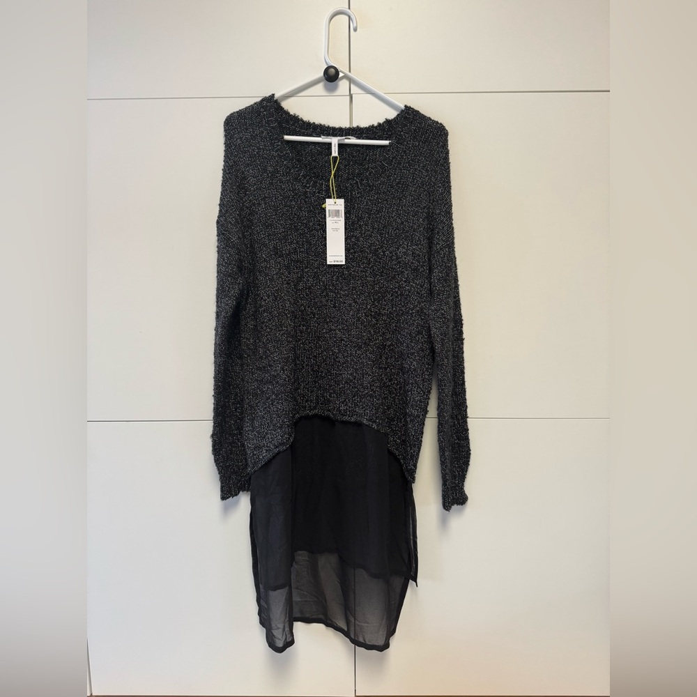 NWT BCBGeneration Chic Black Sweater with Sheer Hem. Size M/L